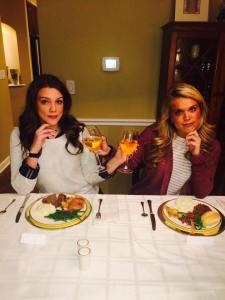 Two of my children toasting sparkling grape juice to a Steaksgiving feast.